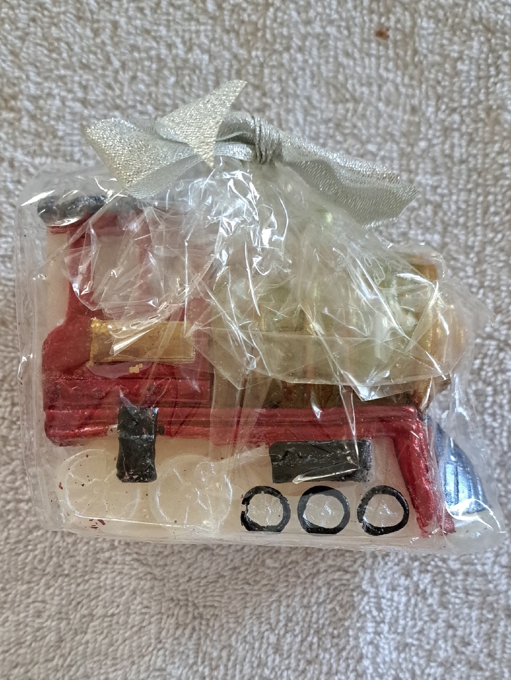Red and Gold Toy Train Candle